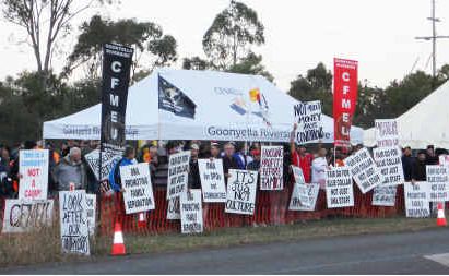 More than 300 workers waved signs at the union protest line near Moranbah on Wednesday morning. More than 300 workers waved signs at the union protest line near Moranbah on Wednesday morning.